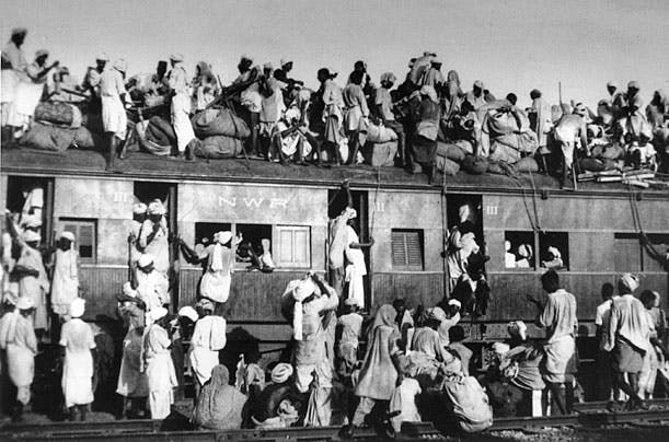 A train transfers refugees during the partition of India, 1947 (Wikimedia Commons)