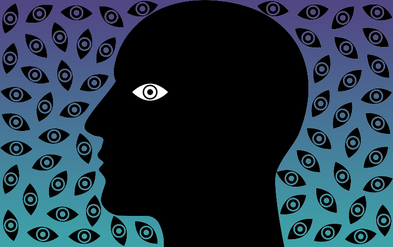 Silhouette of a face with watchful eyes (OpenClipArt)