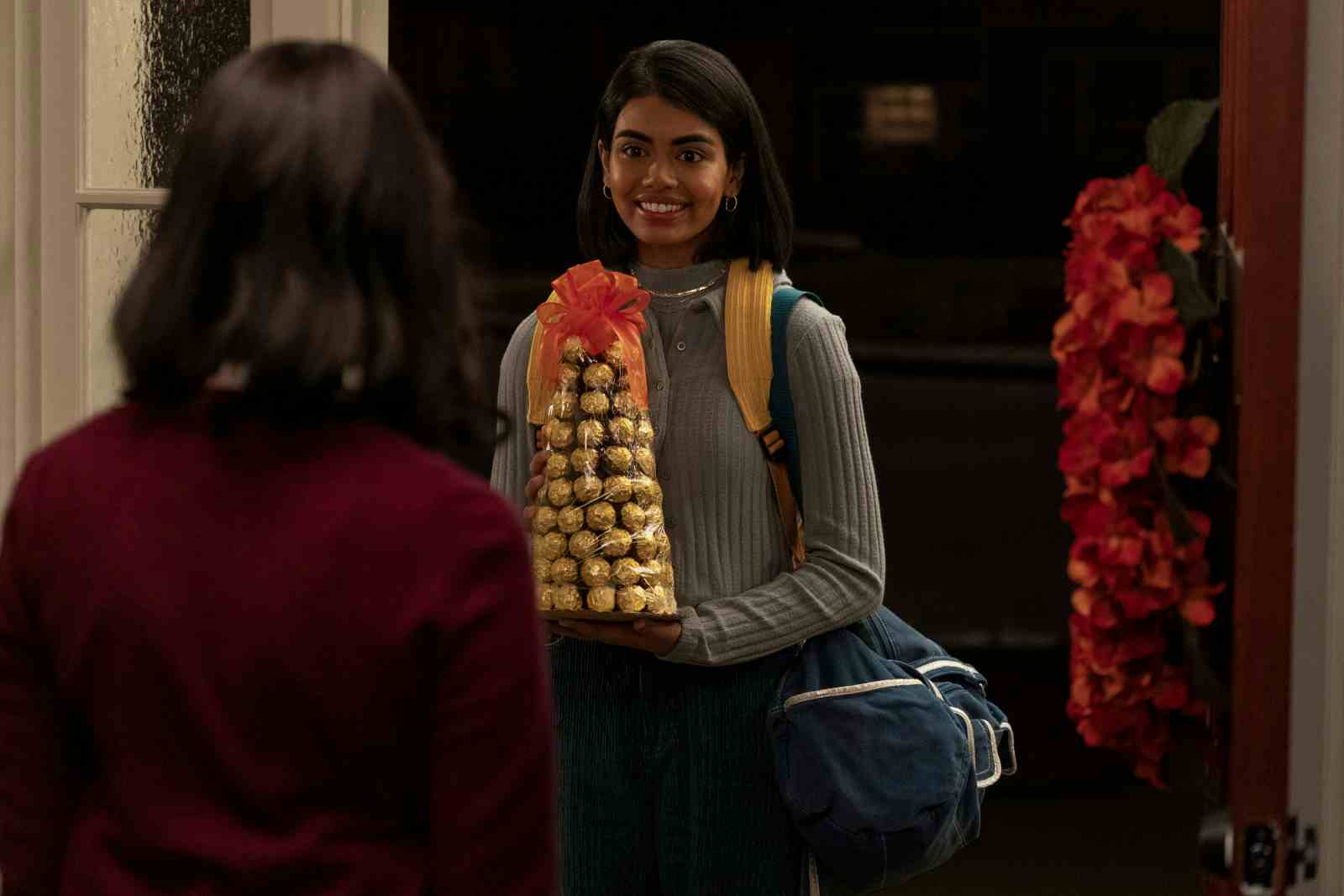 Aneesa (Megan Suri) gifts Ferrero Rocher to Nalini (Poorna Jagannathan) in Never Have I Ever Season 2 (Netflix)