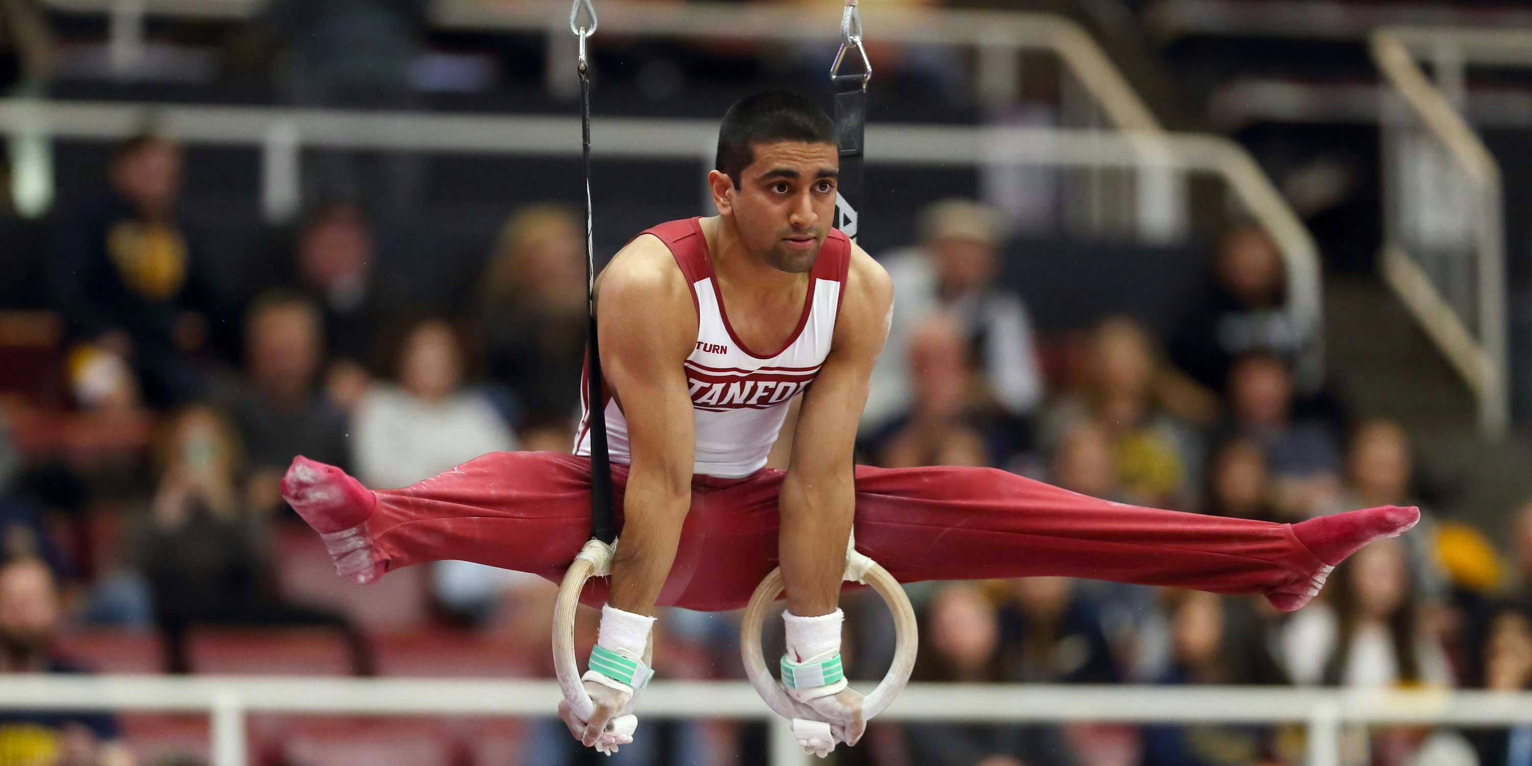 Stanford gymnast Akash Modi competing in March 2014. (Hector Garcia-Molina/ISIPhotos)