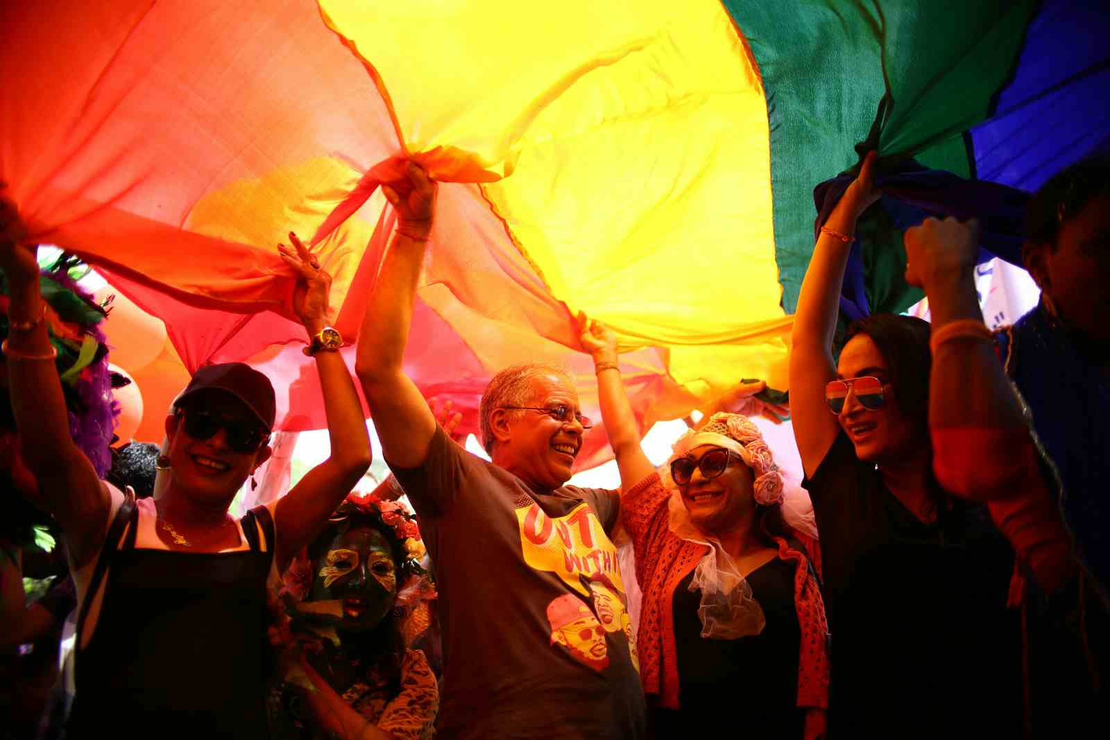 Members of Nepal's LGBT community take part in a gay pride parade in Kathmandu on August 27, 2018 (Gopen RAI / AFP via Getty Images)