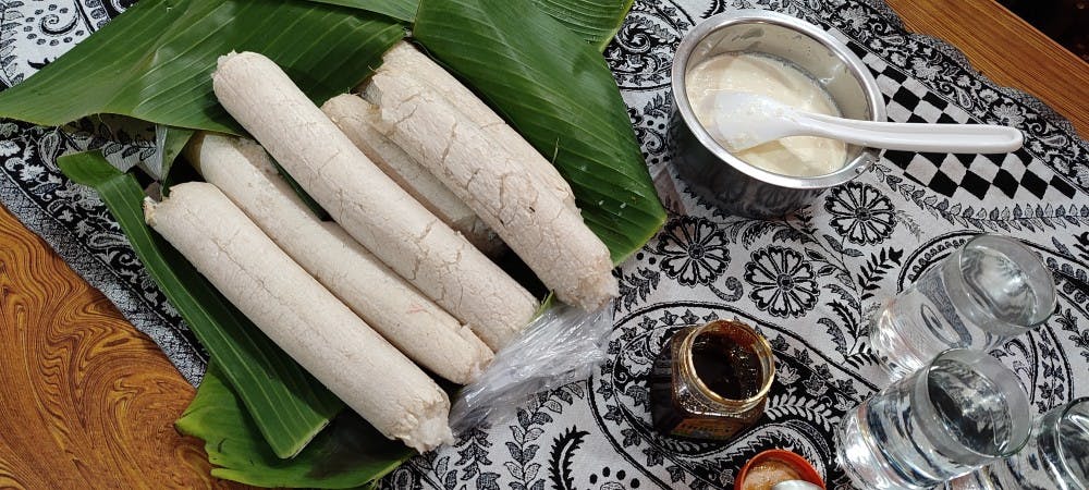 Bamboo Rice Cakes or Sunga pitha served with curd and sura (Arundhati Nath)