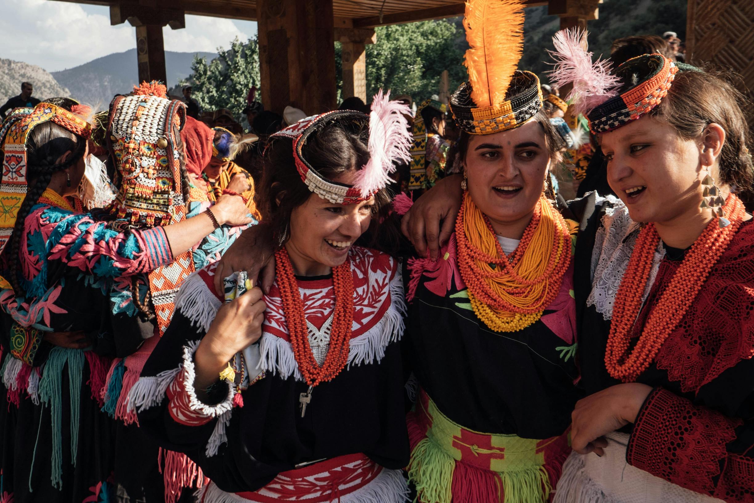 Kalasha girls dance in tradional pirouettes to celebrate the Uchal