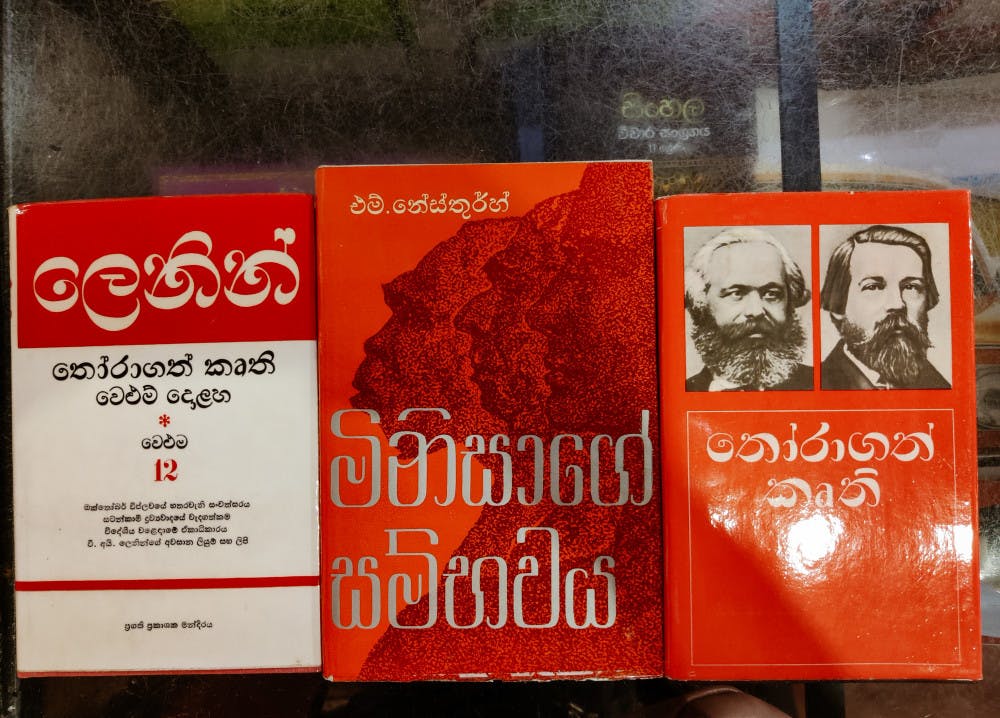 Book by M Nesthurh about human evolution and selected writings by Lenin (Zinara Rathnayake, taken at Duishenge Pothhala — Rusiyawa Publishers)